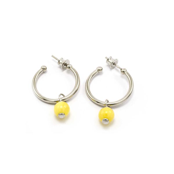 Round silver earrings with a drop of yellow amber