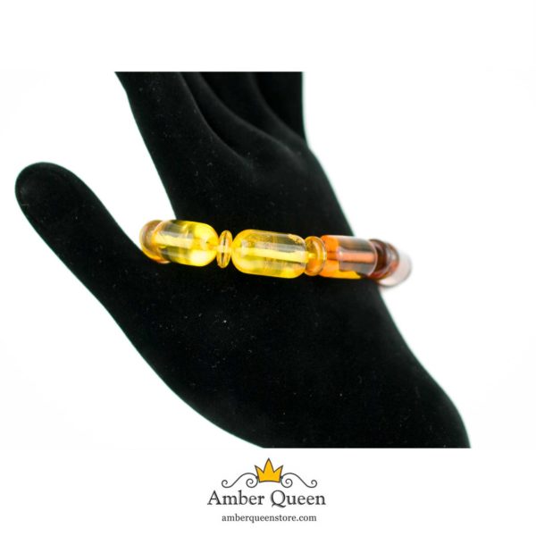 Multicolor Amber Bracelet Rainbow Beads on Hand