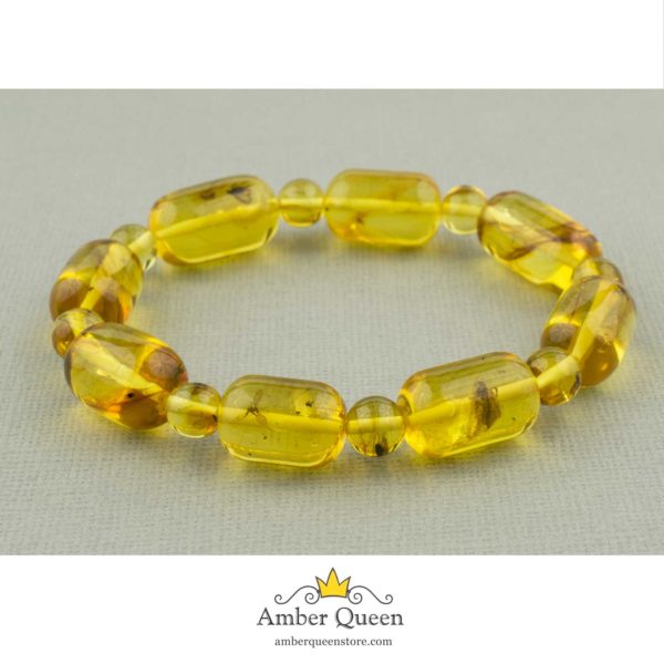 Yellow Transparent Amber Bracelet with Inclusions on Grey