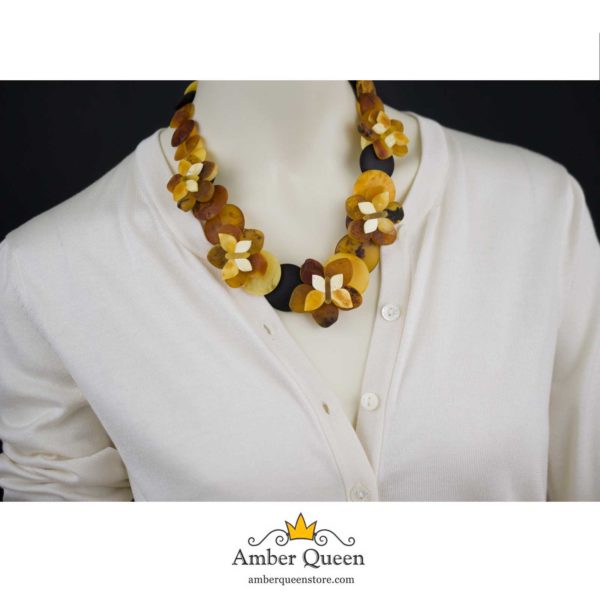 Amber Necklace Disks Buterfly and Flowers on Mannequin